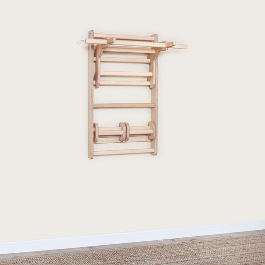 MowoFit Compact 126cm wall bar, a space-saving handcrafted solid Beech wood Swedish ladder designed for modular home gym fitness and stylish interior decor.