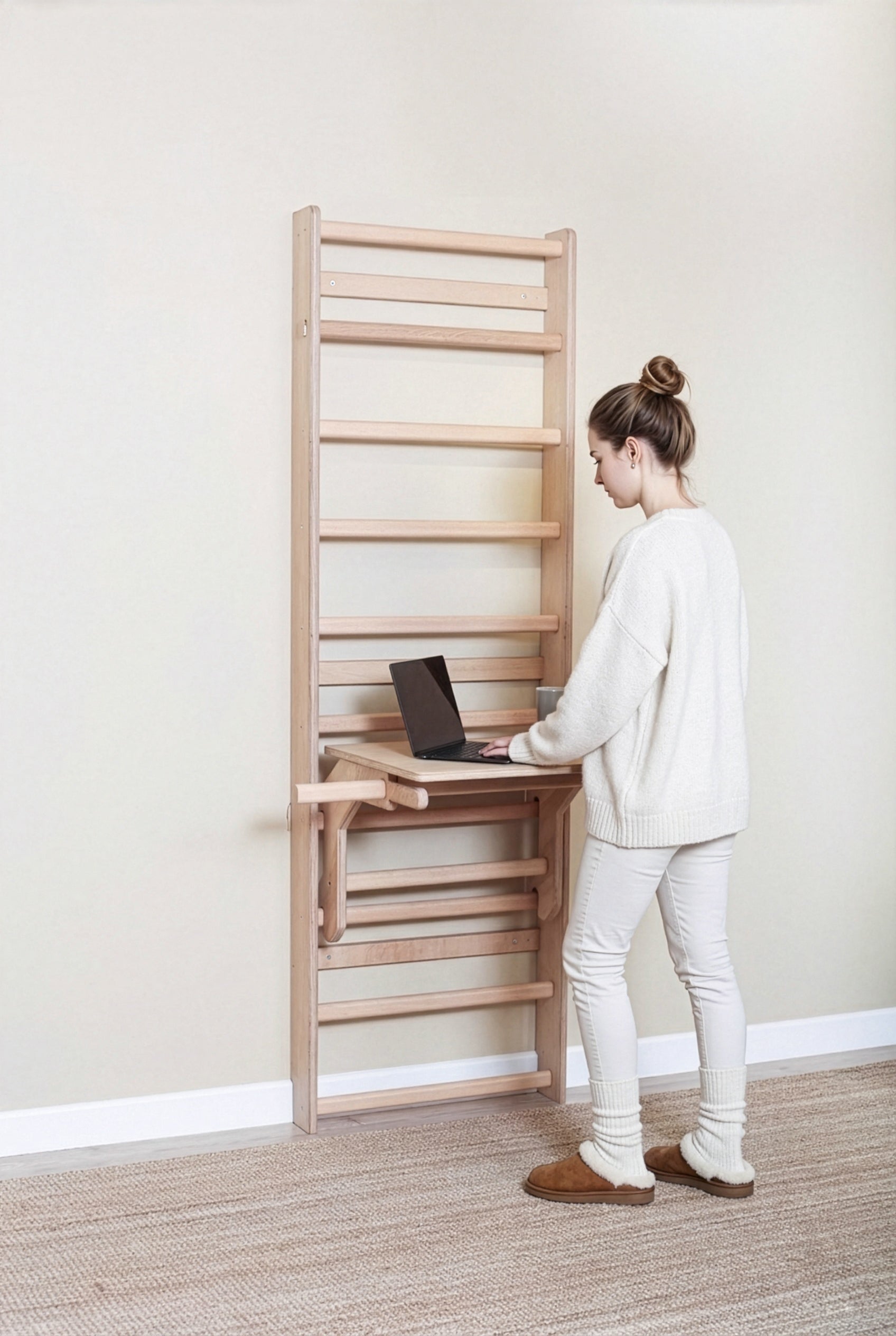 User utilizing the MowoFit Wall Bar as an ergonomic wooden standing desk, highlighting the space-saving design and premium craftsmanship for remote work setups.